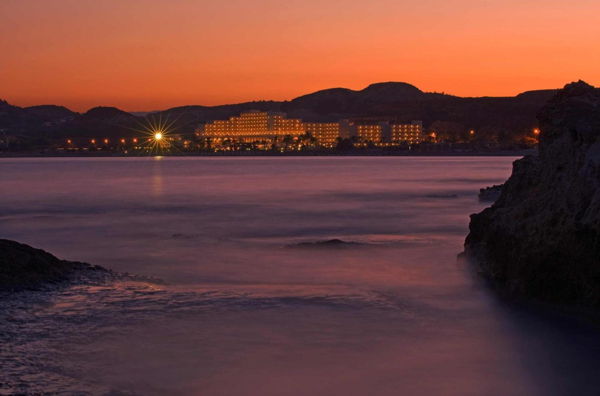 Rodos Palladium Leisure & Wellness Mourátagas Exterior photo Sunset at the Four Seasons Resort